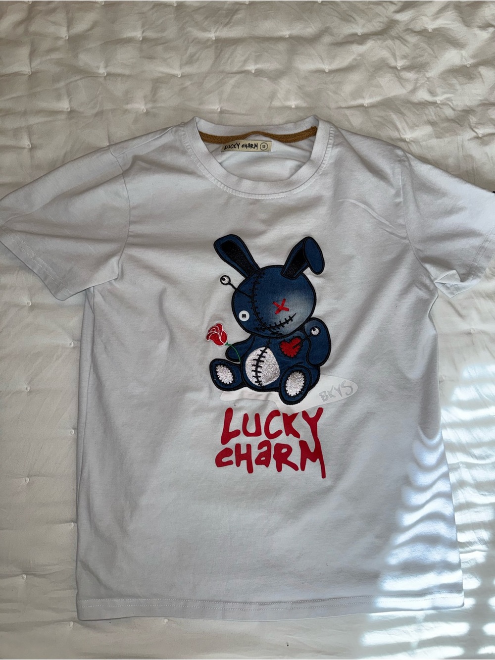 Lucky Charm Brand White Tee with Navy Bunny and Red Text